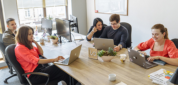 LaSoft people are watching the funny photos of holiday party